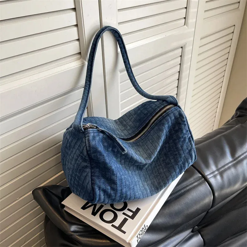 Distressed denim shoulder bag