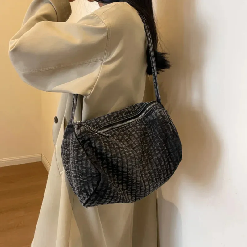 Distressed denim shoulder bag