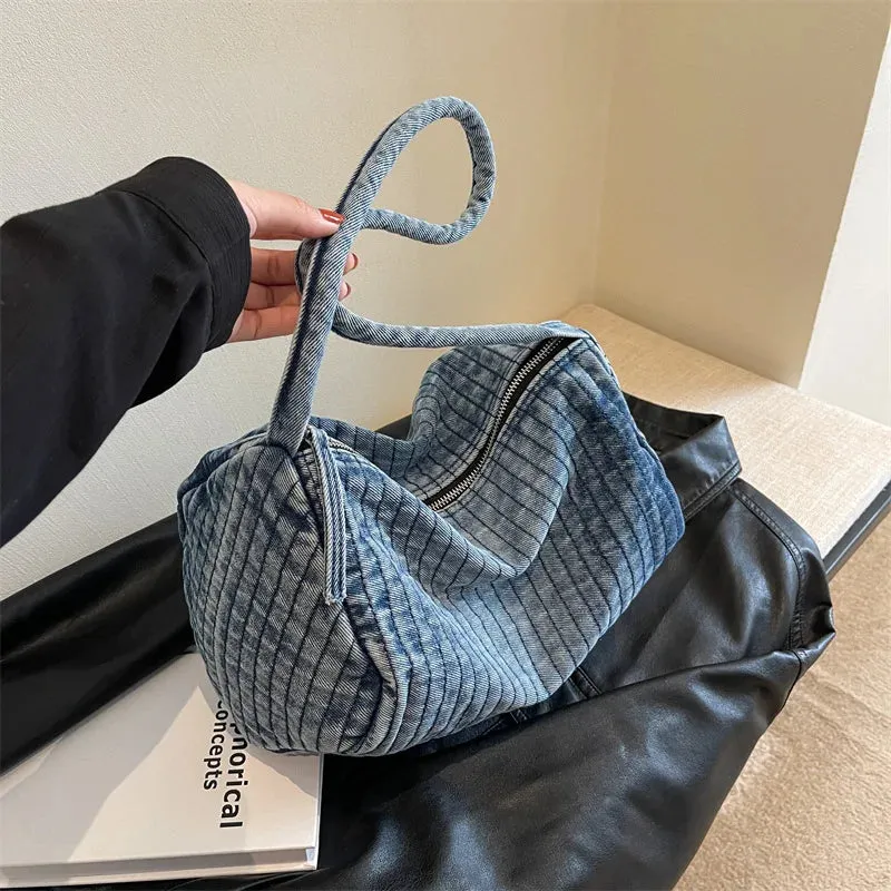Distressed denim shoulder bag
