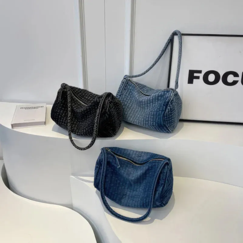 Distressed denim shoulder bag