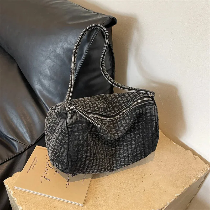 Distressed denim shoulder bag