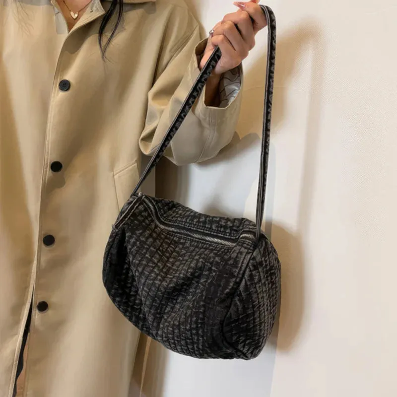 Distressed denim shoulder bag