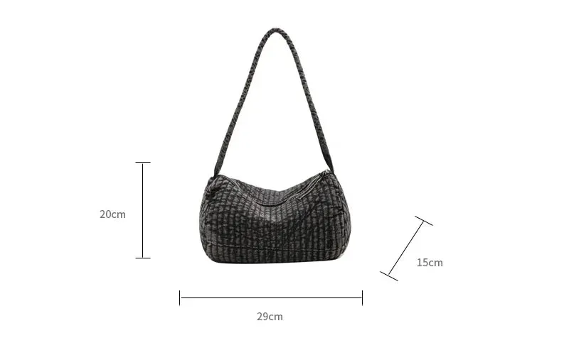 Distressed denim shoulder bag